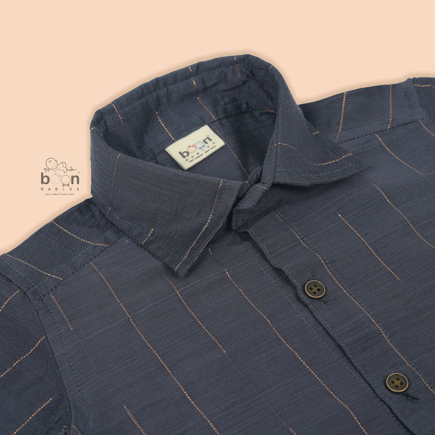 Boys silk shirt in steel blue with golden vertical stripes, paired with white dhoti – festivewear by Boon Babies, Coimbatore.