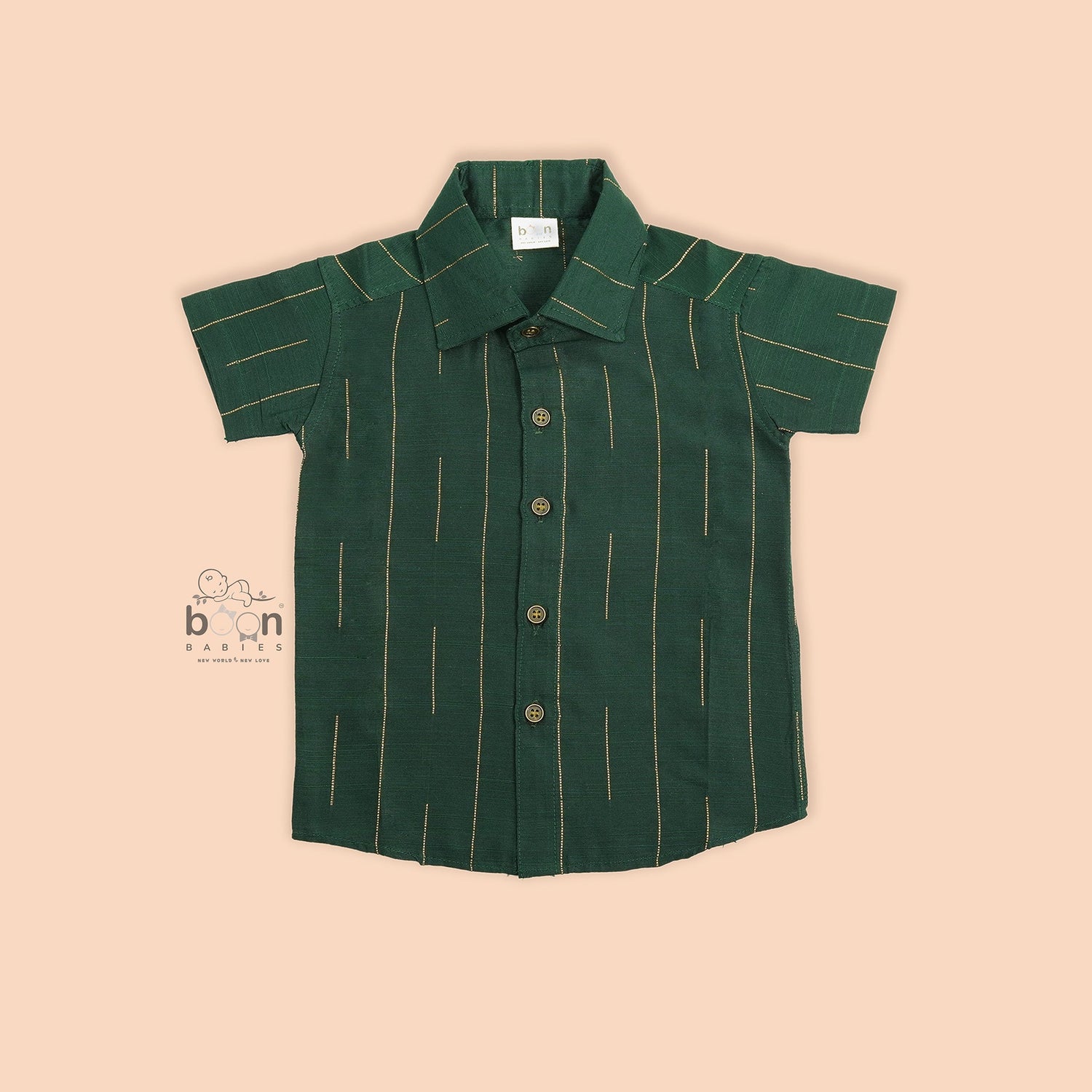 Bottle green silk shirt for boys with golden vertical threads, paired with white pattu dhoti – Boon Babies festive ethnic wear for toddlers.
