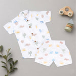 Boys wearing a Boon Babies printed cotton shirt with straight collar and matching shorts, casual summer outfit.
