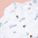 Boys' printed muslin cotton shirt and shorts set with elephant print and straight collar, by Boon Babies.