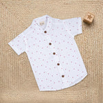 Boys red heart print muslin cotton shirt and shorts set with straight collar by Boon Babies, featuring a printed design and comfortable fit.