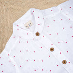 Boys red heart print muslin cotton shirt and shorts set with straight collar by Boon Babies, featuring a matching printed design.