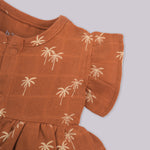 Brown crinkled muslin printed frill frock for baby girls by Boon Babies, featuring delicate frill details.