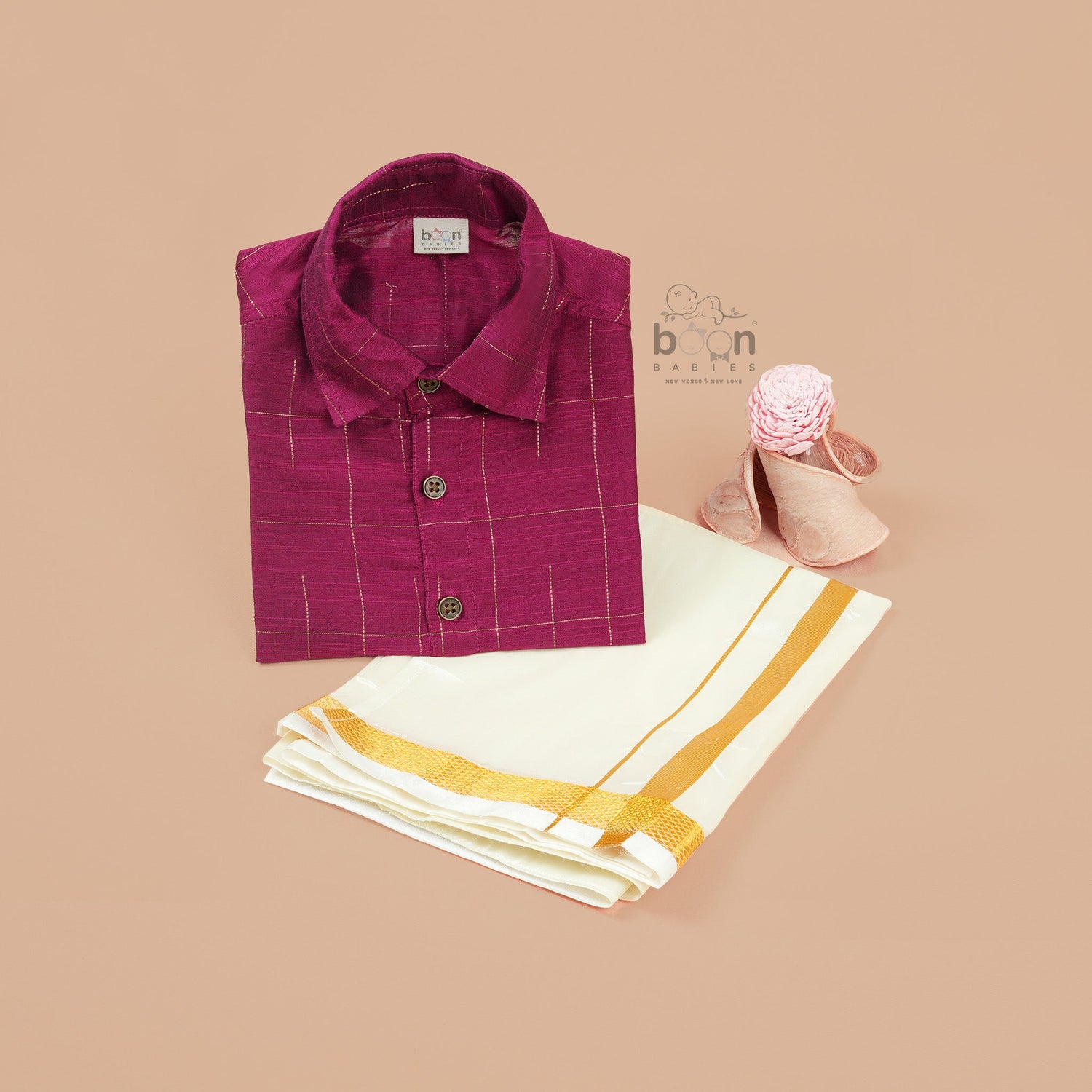 Boys festive outfit with maroon silk checked shirt and white dhoti with gold border – ethnic South Indian look from Boon Babies.

