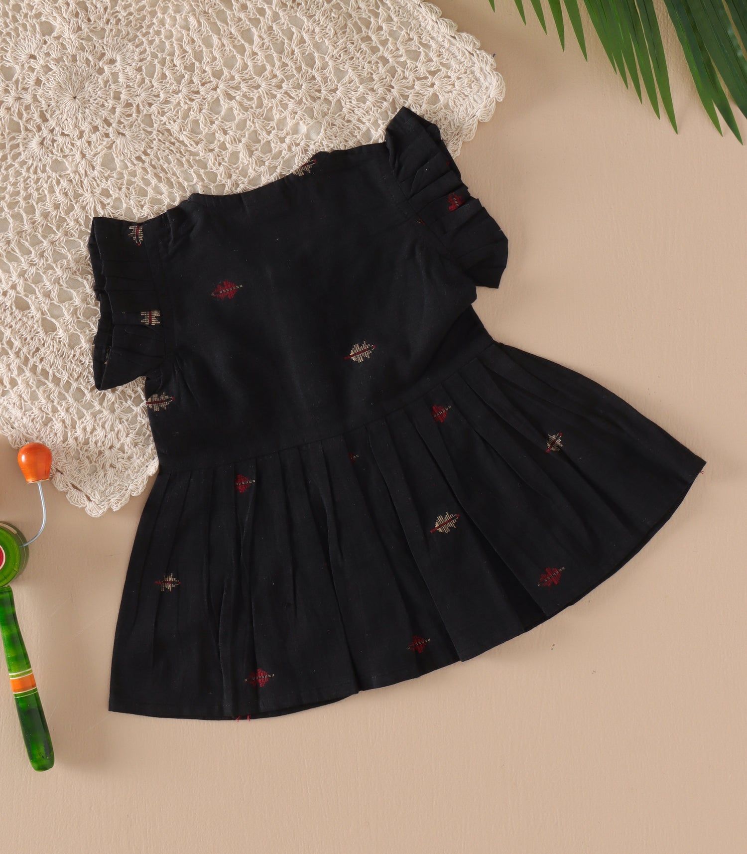 Black South Cotton Baby Frock with Handwoven Butta & Wooden Buttons