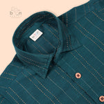 Teal blue silk ethnic shirt for boys aged 12 months to 5 years with wooden buttons and gold stripe detailing – festive babywear by Boon Babies, Coimbatore.
