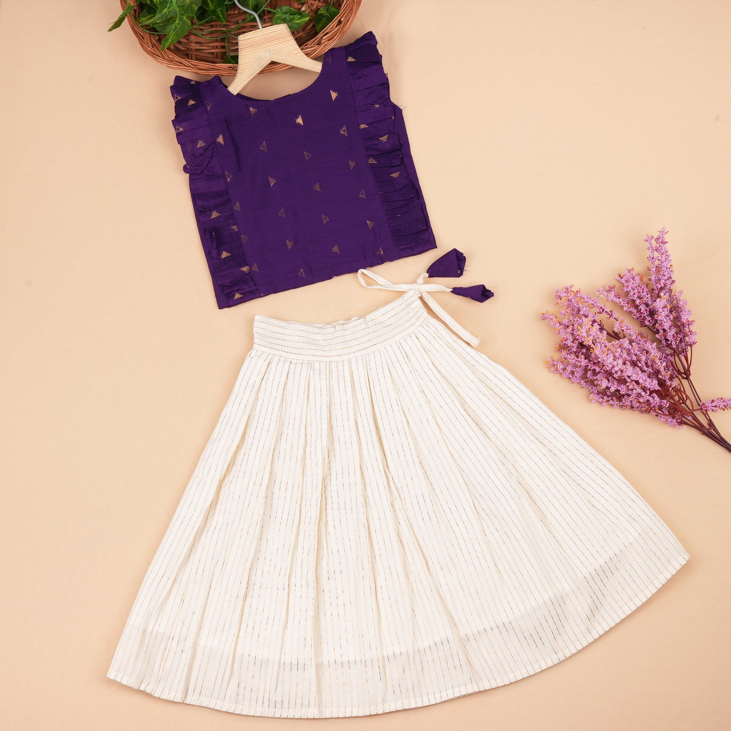 Soft silk ethnic top and skirt set with gold butta print and striped skirt, perfect for traditional and outdoor wear.