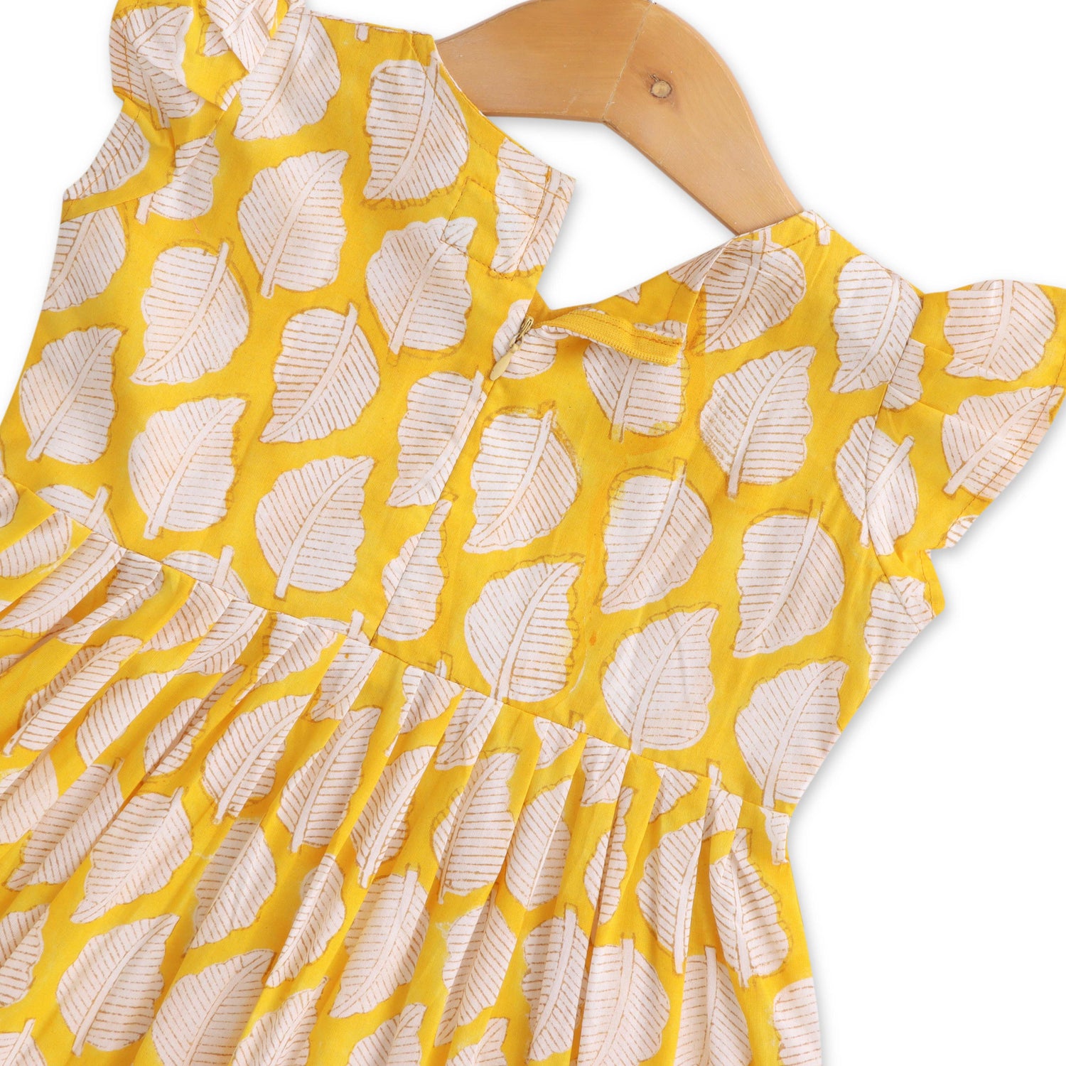 Golden Leaf Gala: Charming Yellow Cotton Frock with Nature-Inspired Prints