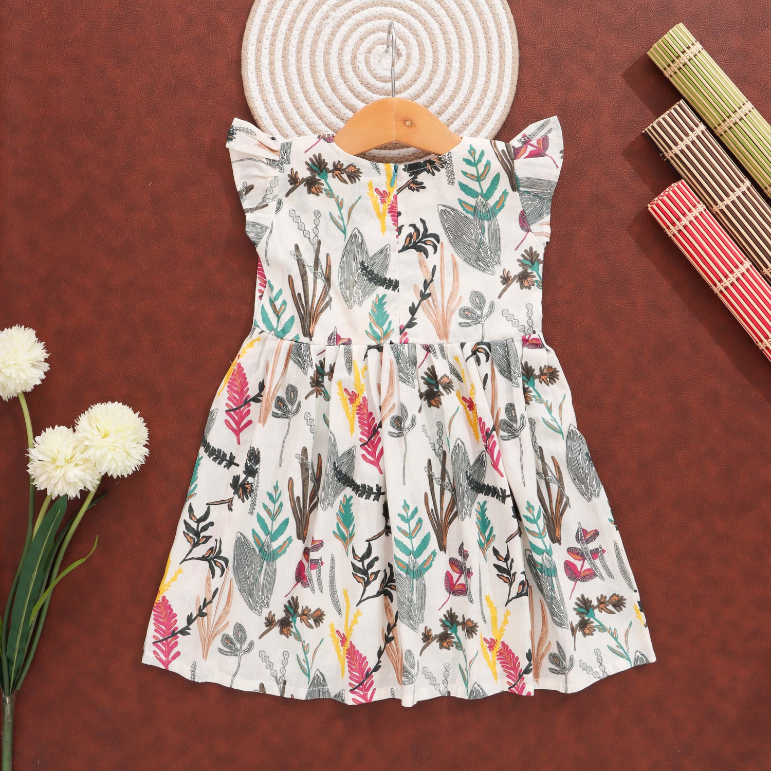 Nature’s Palette: Artistic Botanical Print Frock for Little Ones