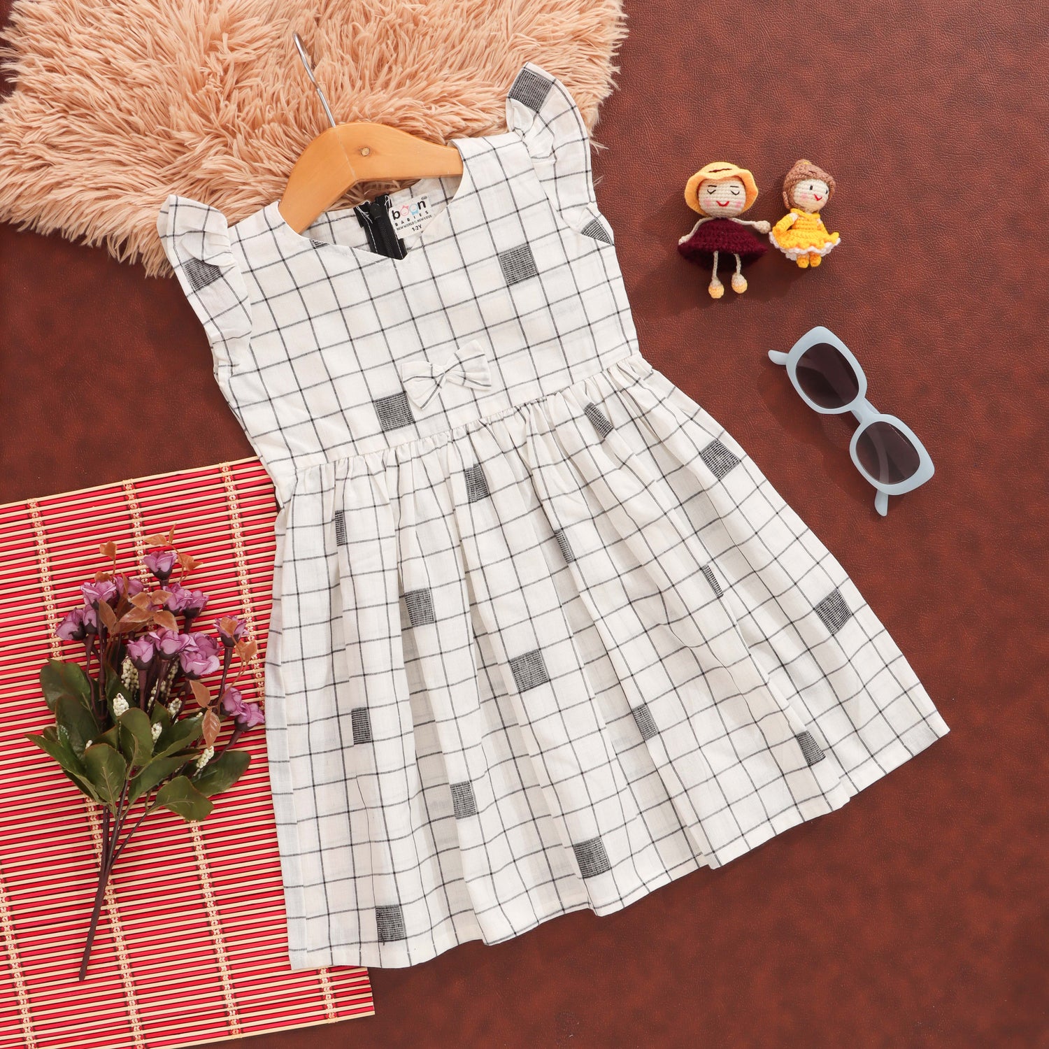 Grid Elegance: Sophisticated Checked Pattern Frock