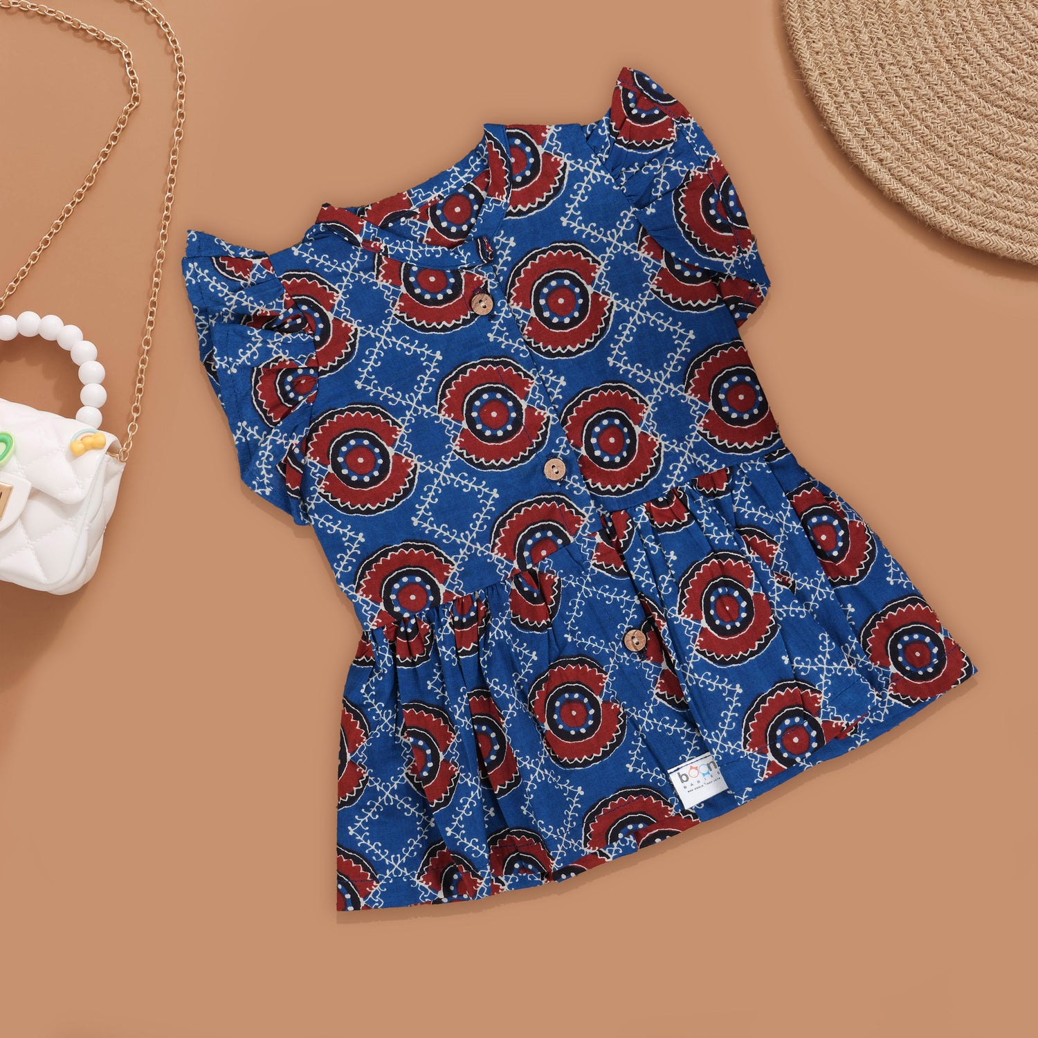 Timeless Charm: Baby's Printed Frock with Button Details