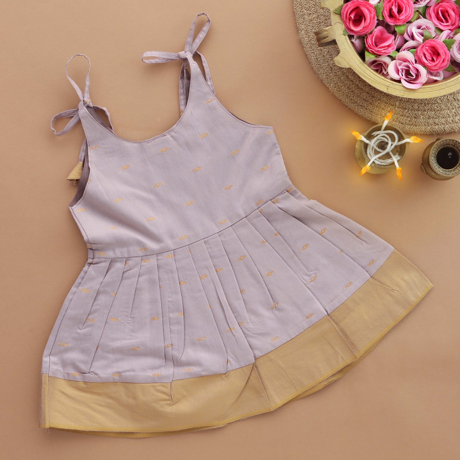 Lavender Chic: Pleated Girls Tieup Frock with Playful Tassels