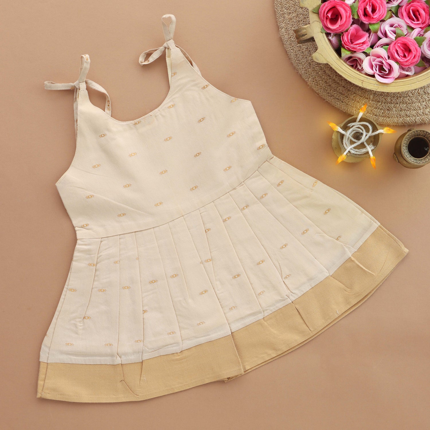 Ivory Whisper: Pleated Skirt Tieup Frock with Charming Tassels