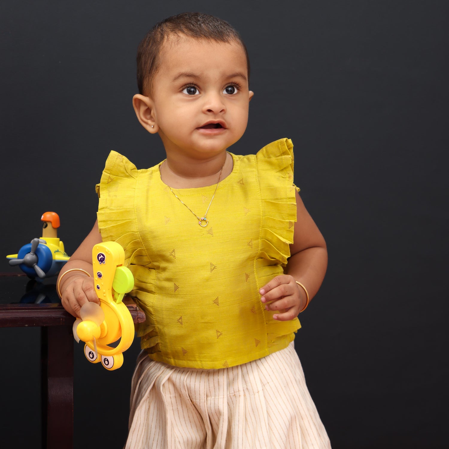 Vibrant Yellow: Ethnic Top with Striped Skirt For Girls