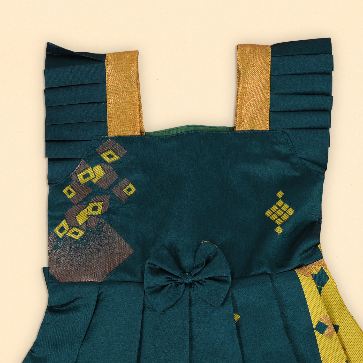 Elegant Green Frock with Bow and Bold Geometric Patterns