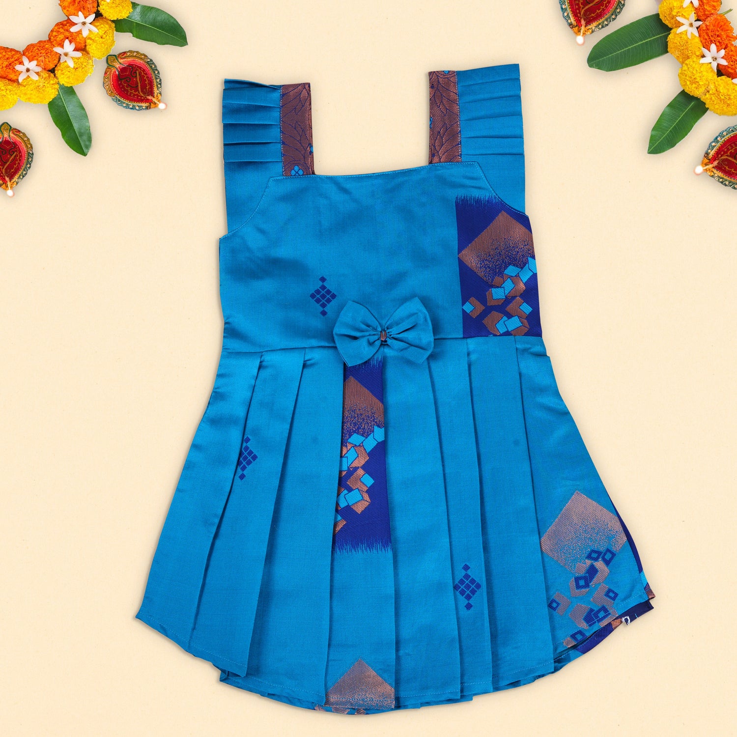 Vibrant Blue Ethnic Frock with Pleated Straps and Elegant Bow