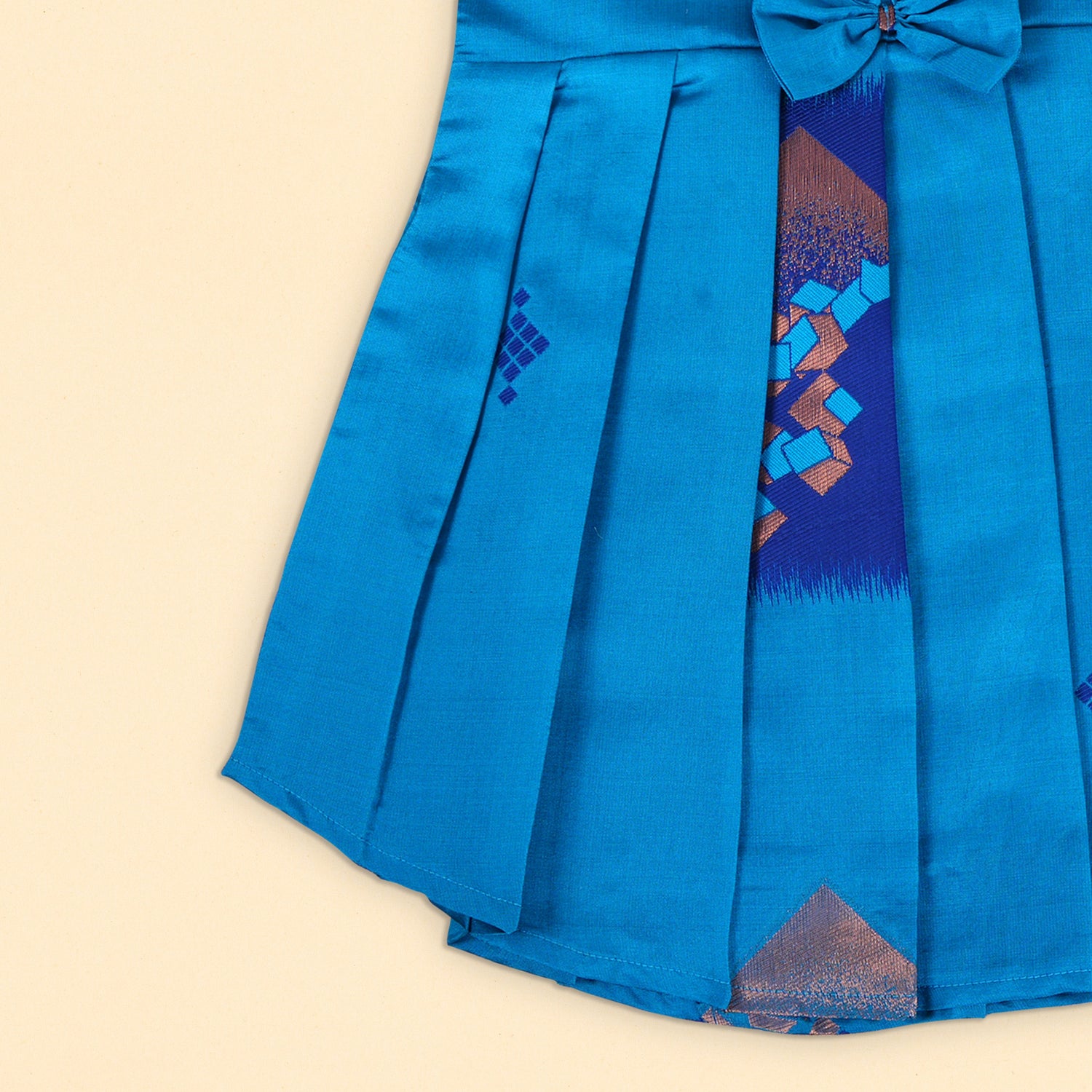 Vibrant Blue Ethnic Frock with Pleated Straps and Elegant Bow