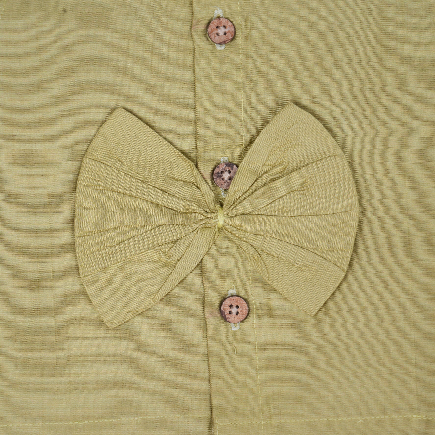 Olive green embroidered cotton top with cream skirt, elastic waist and soft lining – elegant Kerala-style ethnic wear for girls aged 1–5 years.