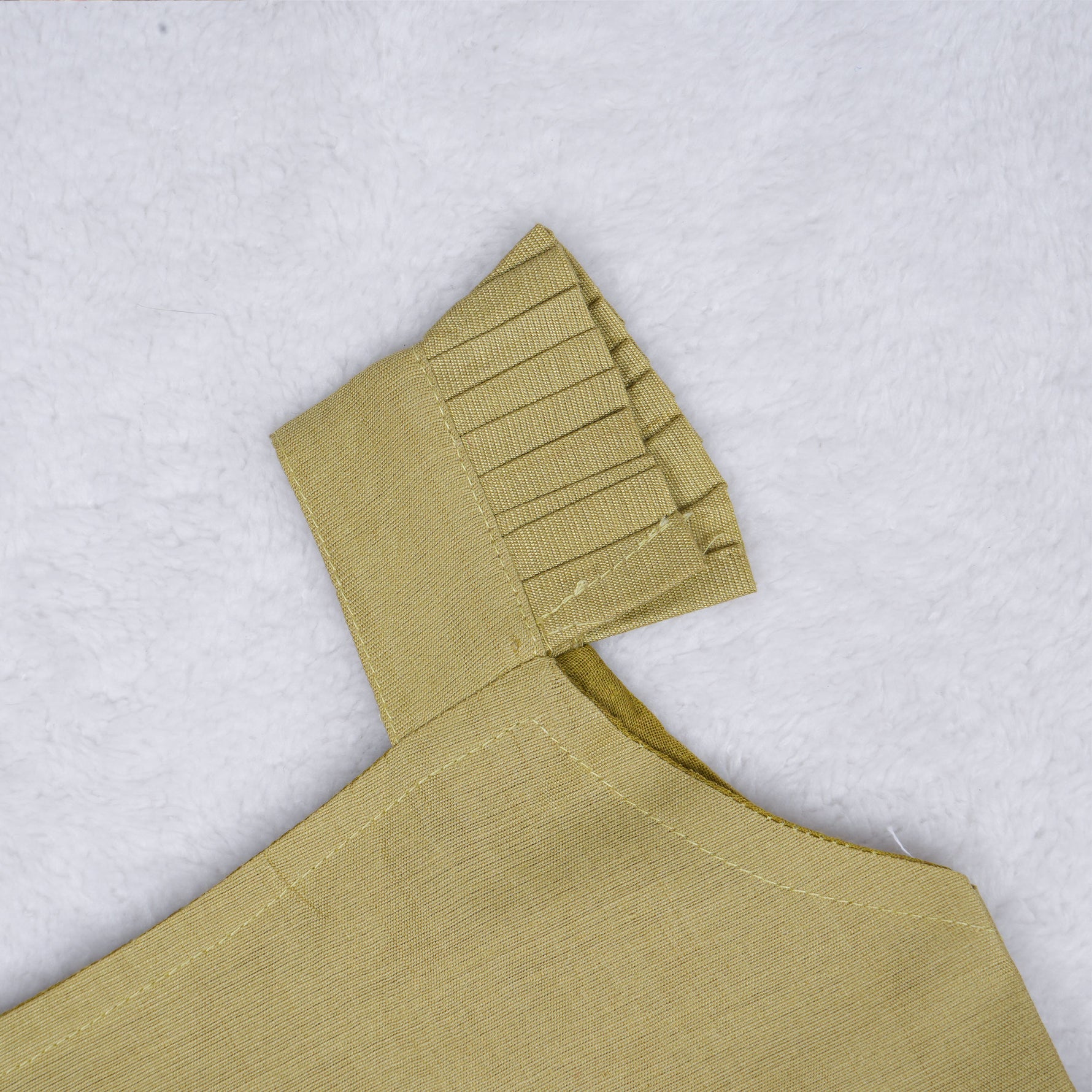 Olive green embroidered cotton top with cream skirt, elastic waist and soft lining – elegant Kerala-style ethnic wear for girls aged 1–5 years.