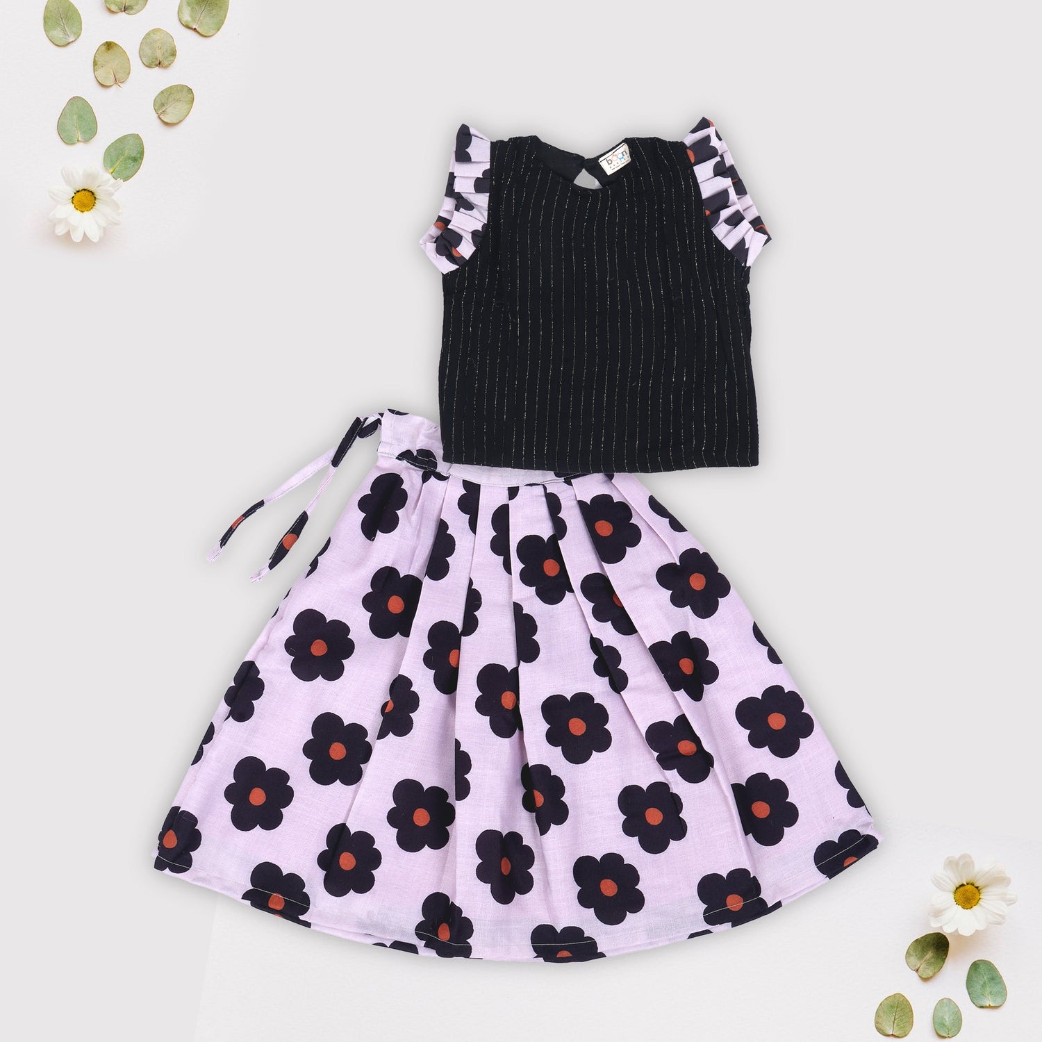 Girls Black Striped Top and Floral Skirt – Bold Blossoms for Any Day