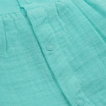 Mint green crinkled muslin frill frock for baby girls by Boon Babies, featuring soft fabric and delicate ruffle details.