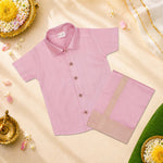Boy wearing a traditional raw silk dhoti set with an ethnic shirt, suitable for festive occasions, by Boon Babies.