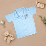 Boys wearing a printed muslin casual shirt with straight collar and matching shorts, embroidered design, summer wear by Boon Babies.