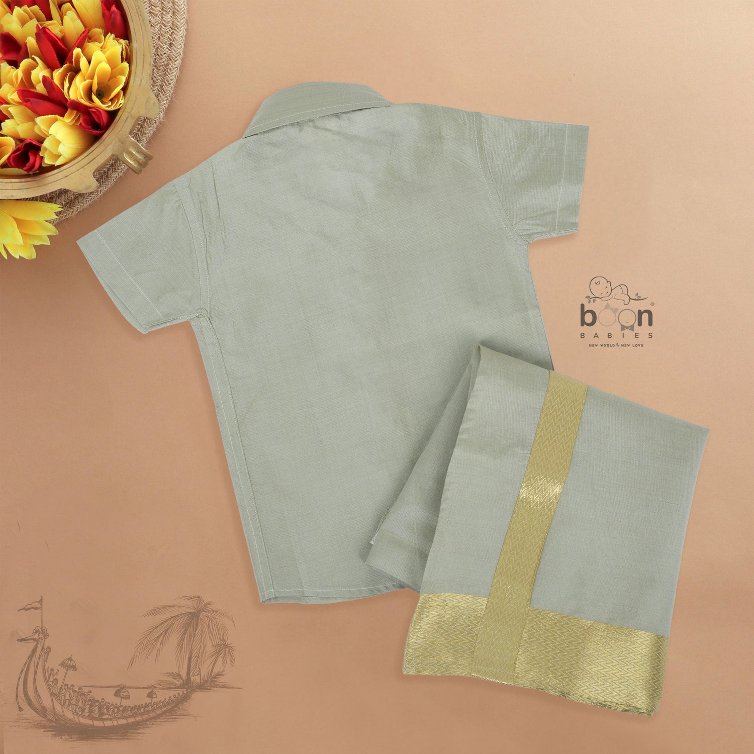 Green-silver silk shirt & dhoti with golden zari border for boys aged 6M–5Y. Perfect festive outfit for Onam & traditional celebrations.