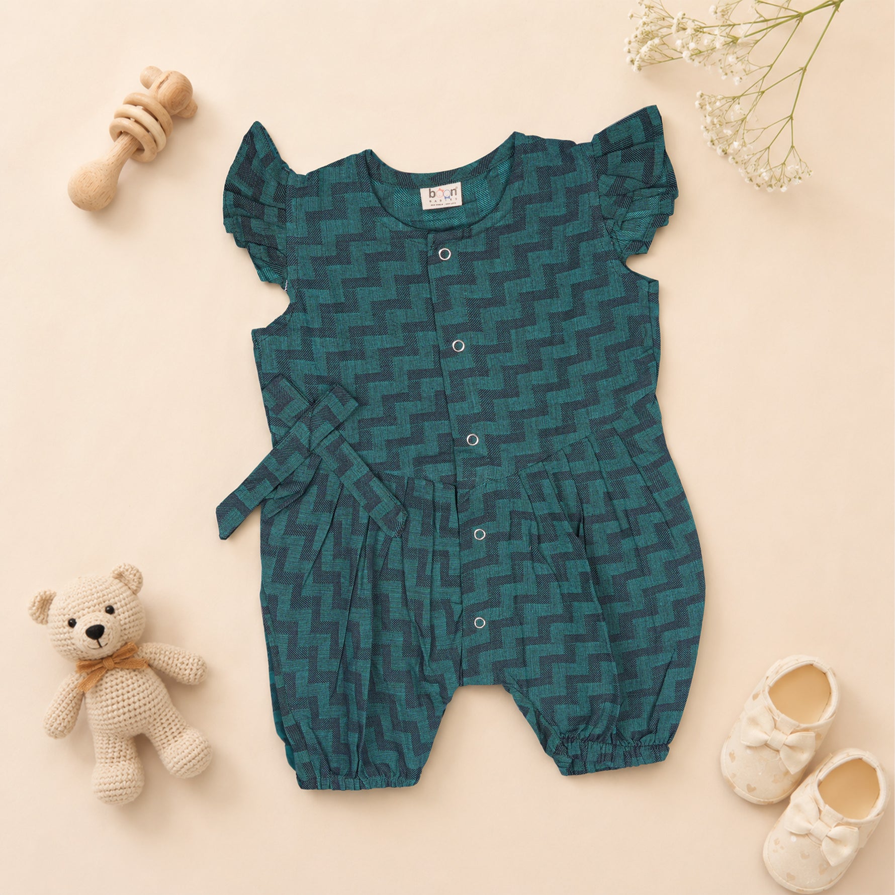 Baby girls green muslin printed romper by Booon Babies with frill sleeves, featuring soft, breathable fabric and cute design.