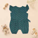Baby girl in green printed muslin romper with frill sleeves, from Booon Babies, featuring soft, lightweight fabric and cute design.