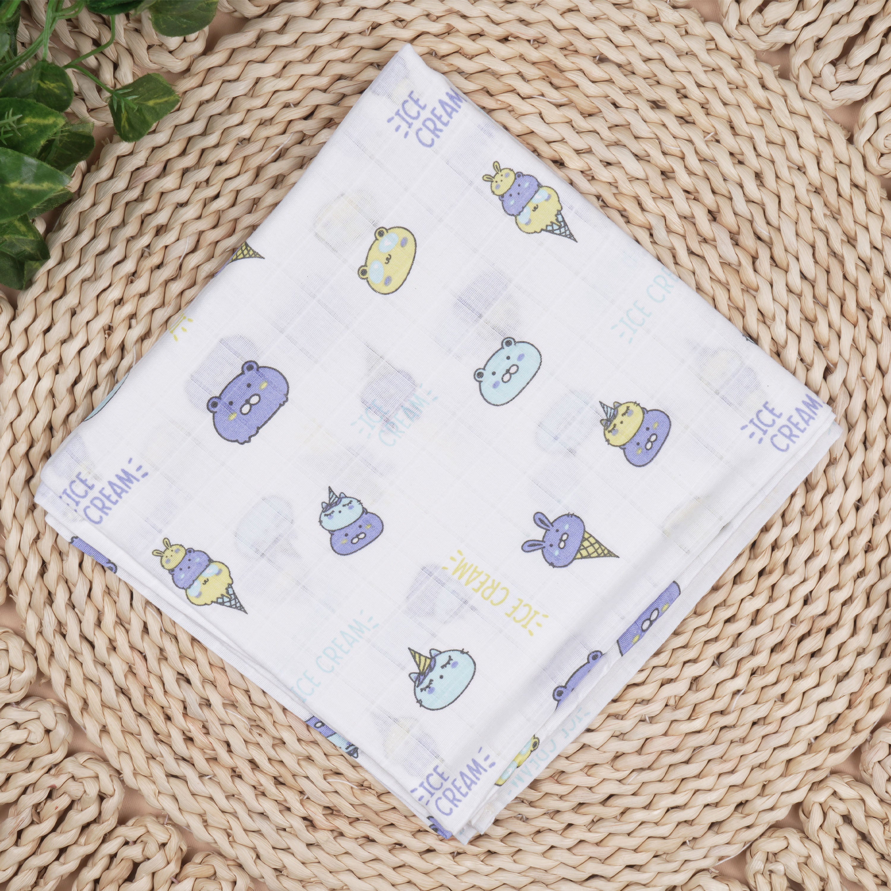 Soft, breathable Boon Babies muslin swaddle blanket with printed design, 100x100 cm, perfect for wrapping and soothing a baby.
