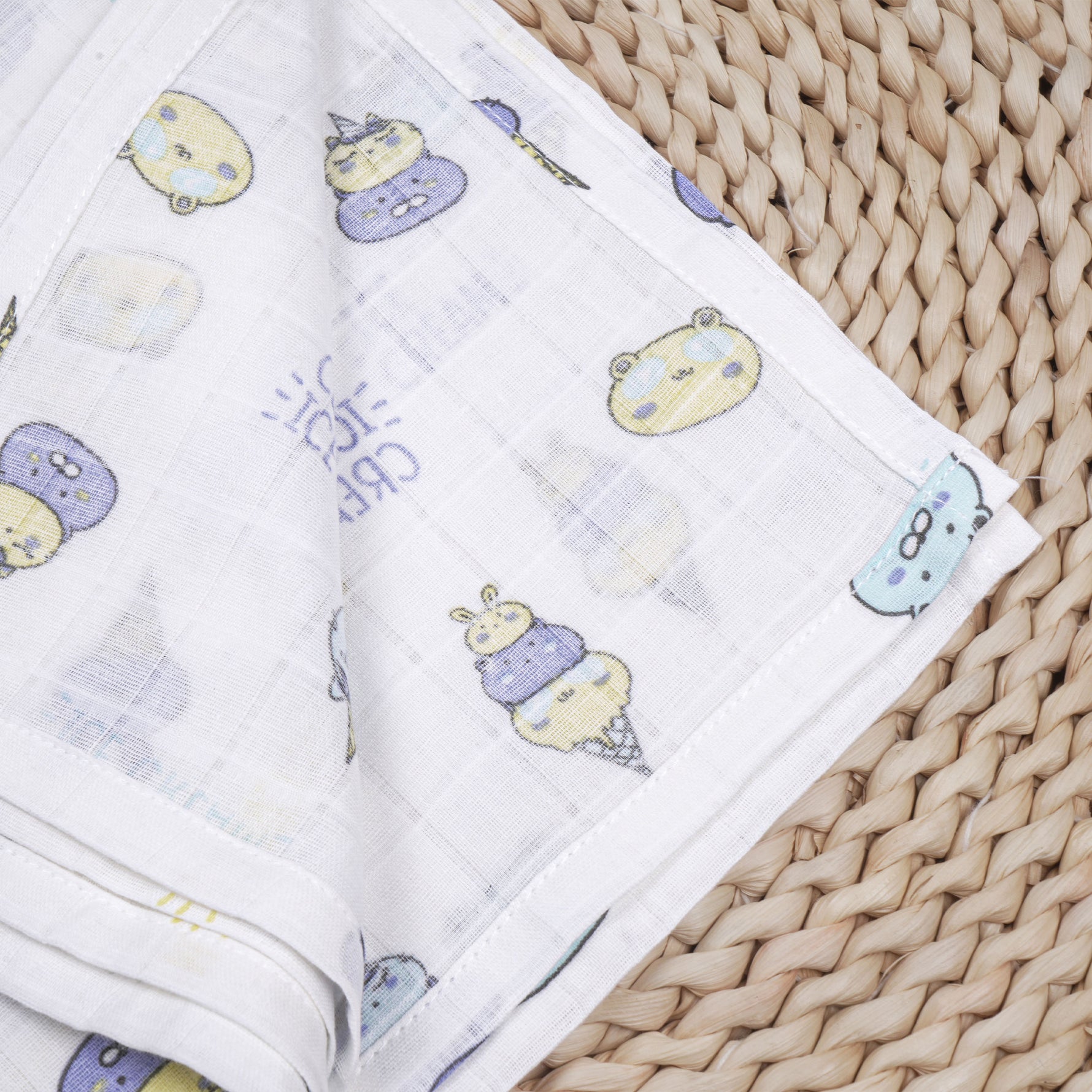 Soft breathable Boon Babies muslin swaddle blanket, 100x100 cm, with printed baby wrap design, ideal for swaddling and comfort.