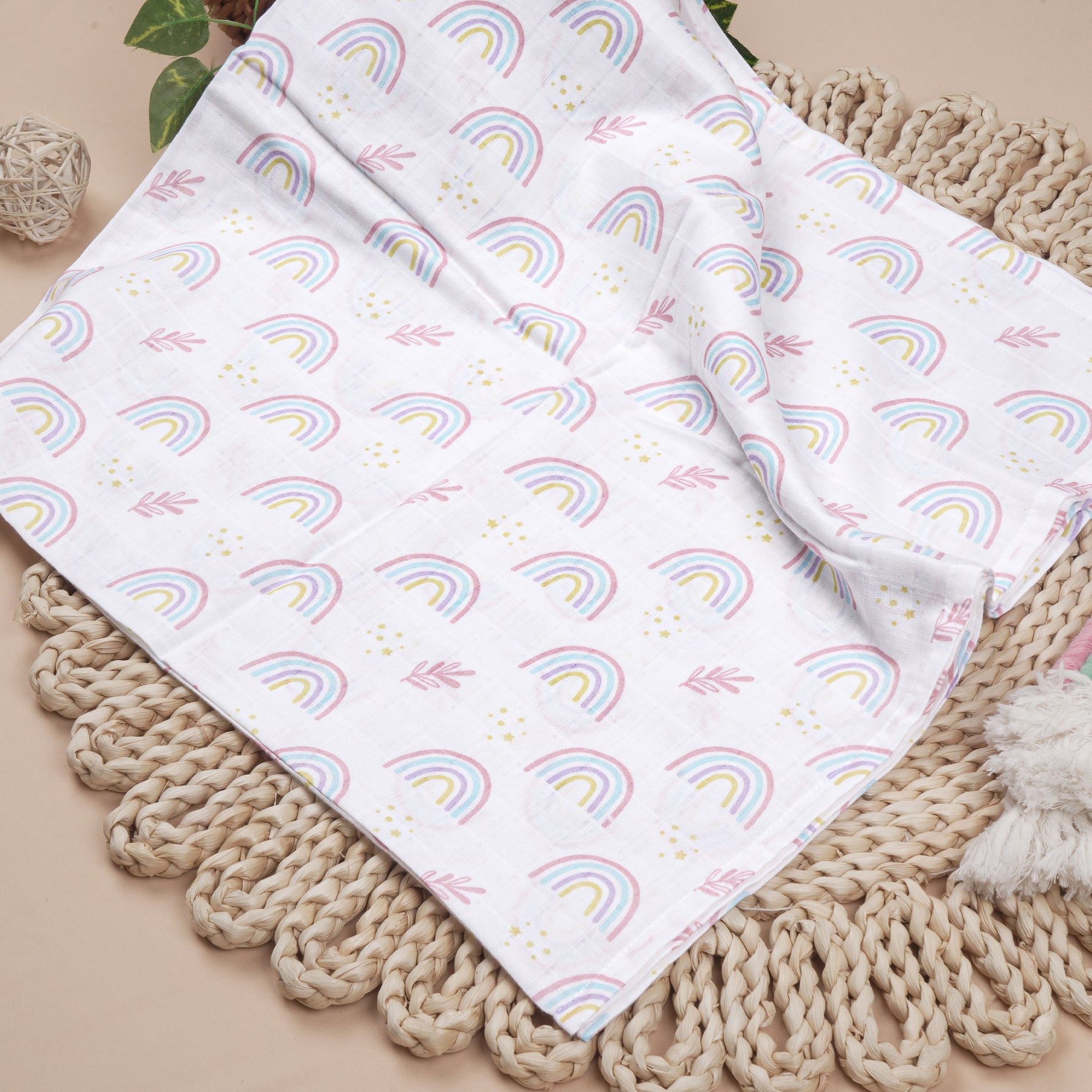 Soft, breathable Boon Babies muslin swaddle blanket with colorful printed design, measuring 100x100 cm, ideal for wrapping babies.