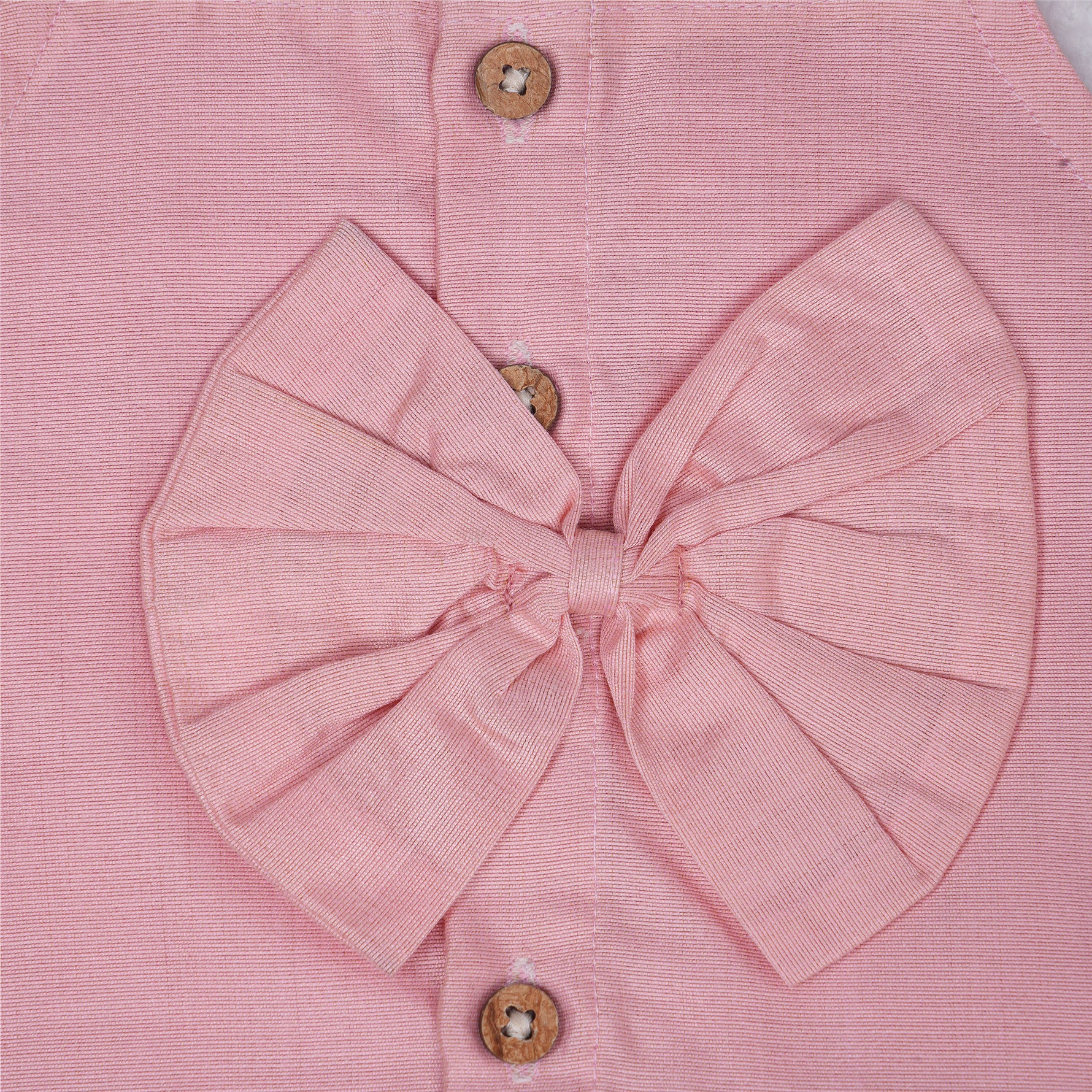 Blush pink embroidered cotton top with cream skirt, elastic waist and lining – elegant Kerala-style ethnic wear for girls aged 1–5 years.