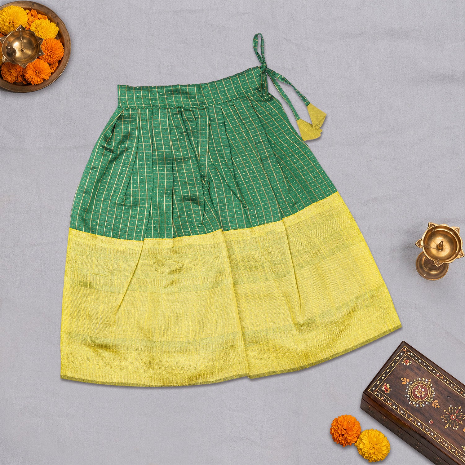 Girls green ethnic top and skirt set by Boon Babies, featuring cotton lining and colorful traditional design.