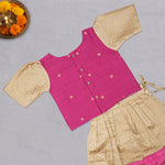 Girls beige and pink ethnic top and skirt set by Boon Babies, featuring traditional patterns and comfortable, stylish design.