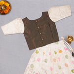 Girls floral cream ethnic top and skirt set by Boon Babies, featuring a traditional design with vibrant floral patterns.