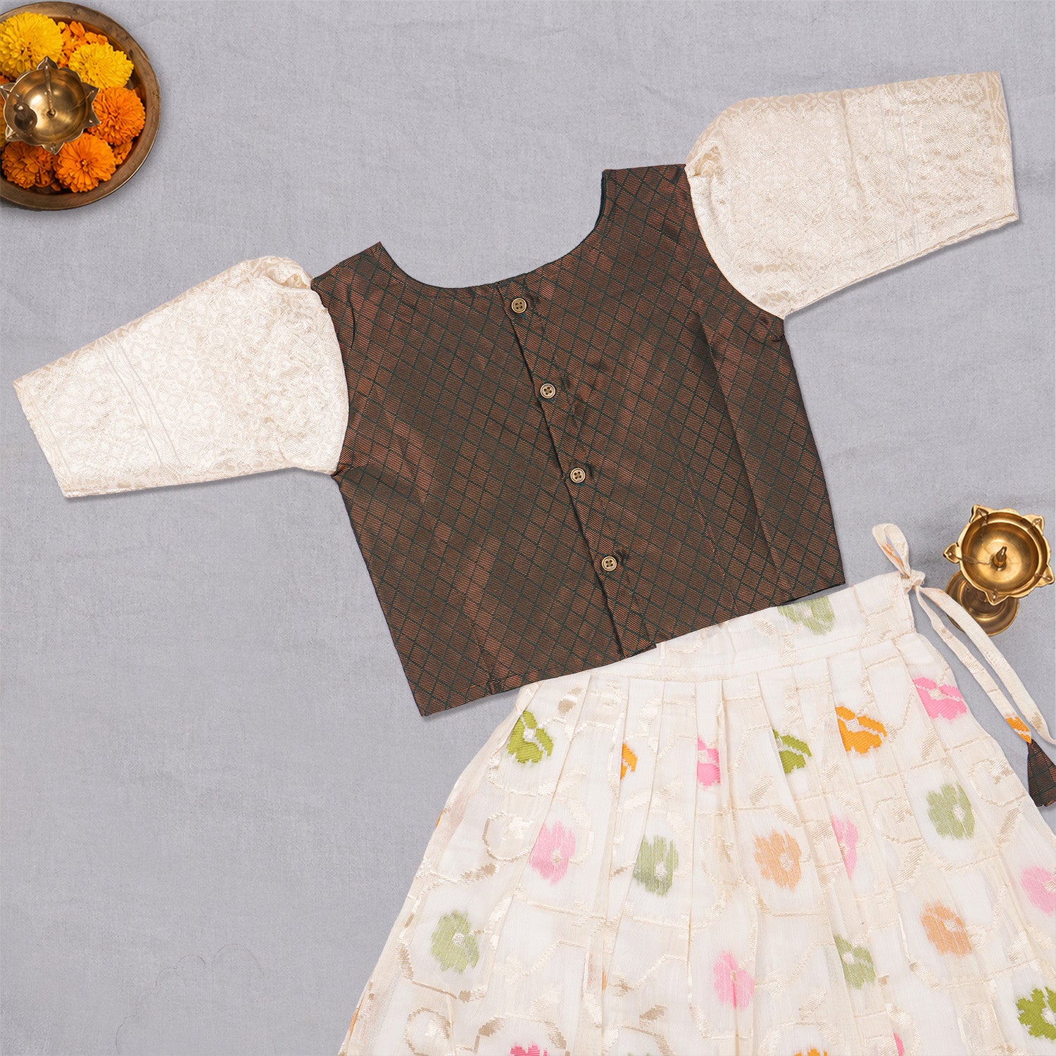 Girls floral cream ethnic top and skirt set by Boon Babies, featuring a traditional design with vibrant floral patterns.