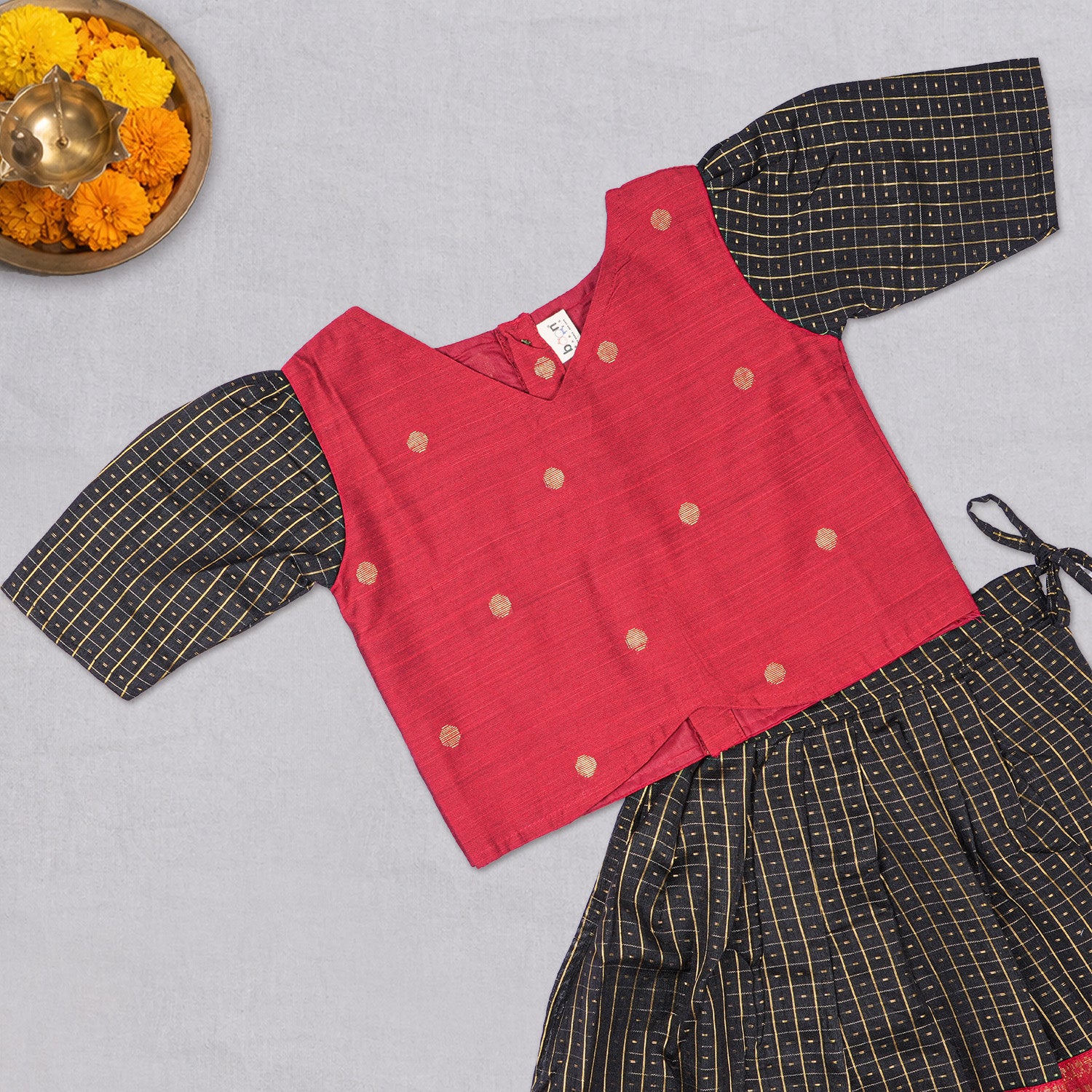 Girls black and red ethnic top and skirt set by Boon Babies, featuring traditional patterns and comfortable fabric.