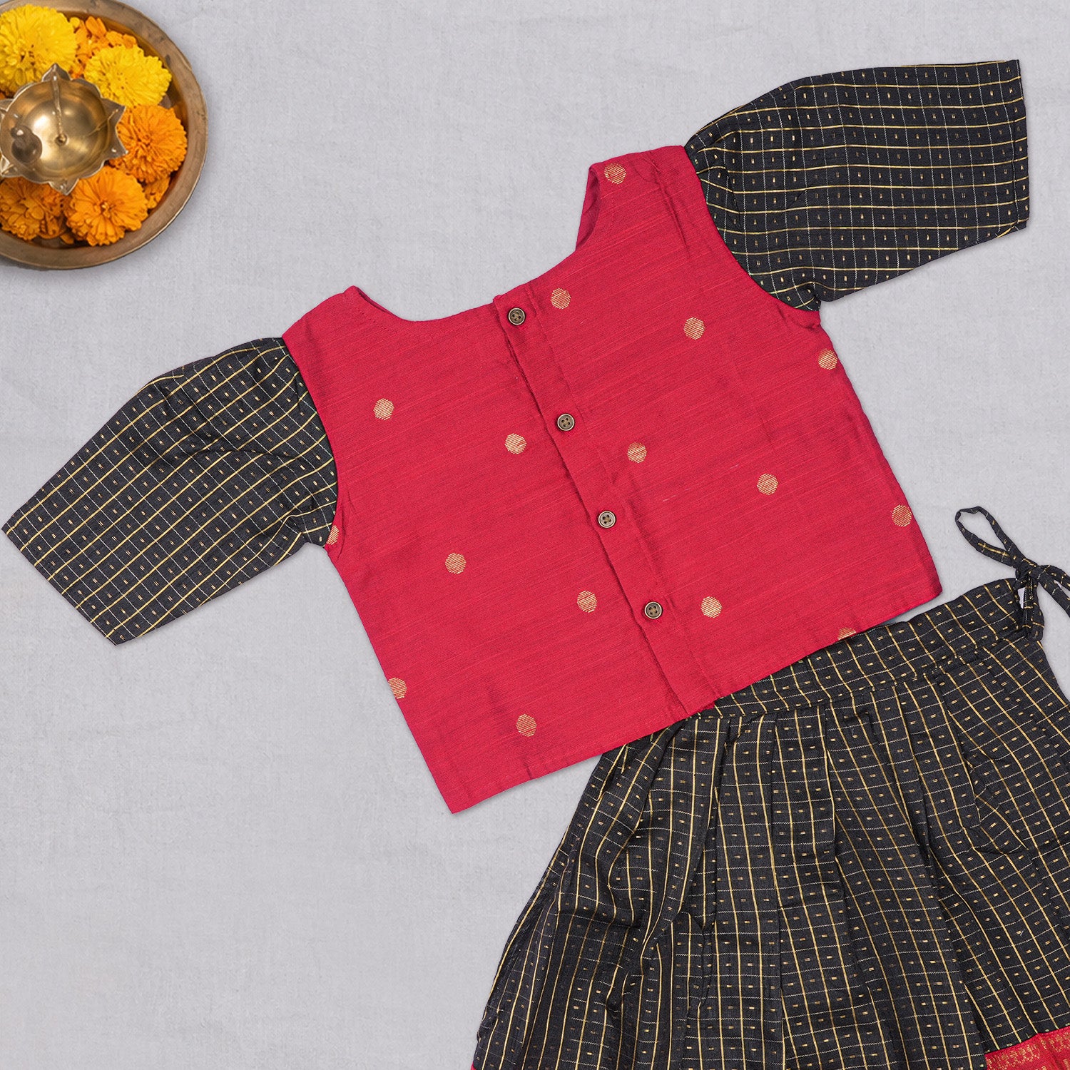 Girls black and red ethnic top and skirt set by Boon Babies, featuring traditional design and vibrant fabric details.