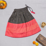 Girls black and red ethnic top and skirt set by Boon Babies, featuring traditional patterns and vibrant colors.
