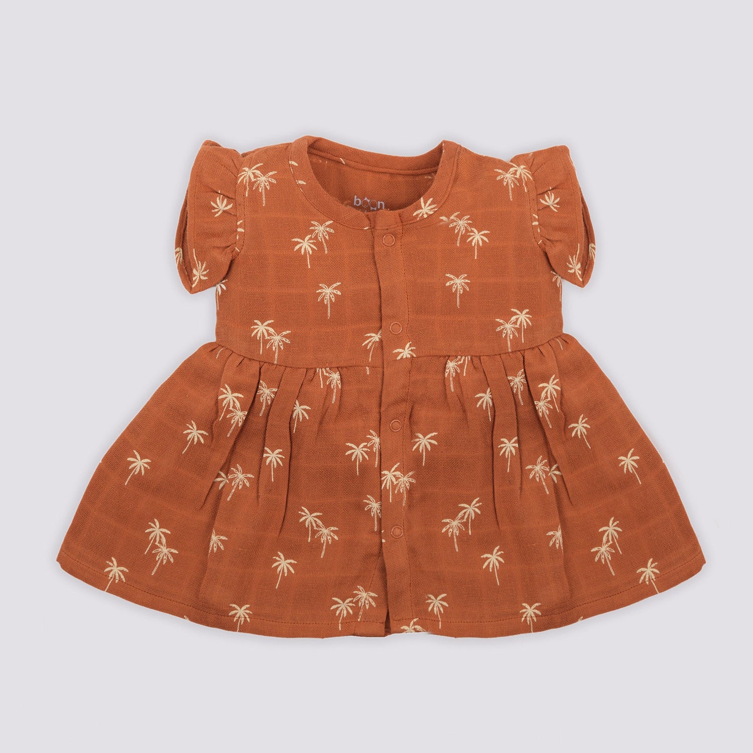 Brown crinkled muslin frill frock for baby girls by Boon Babies, featuring a playful print and delicate frill details.