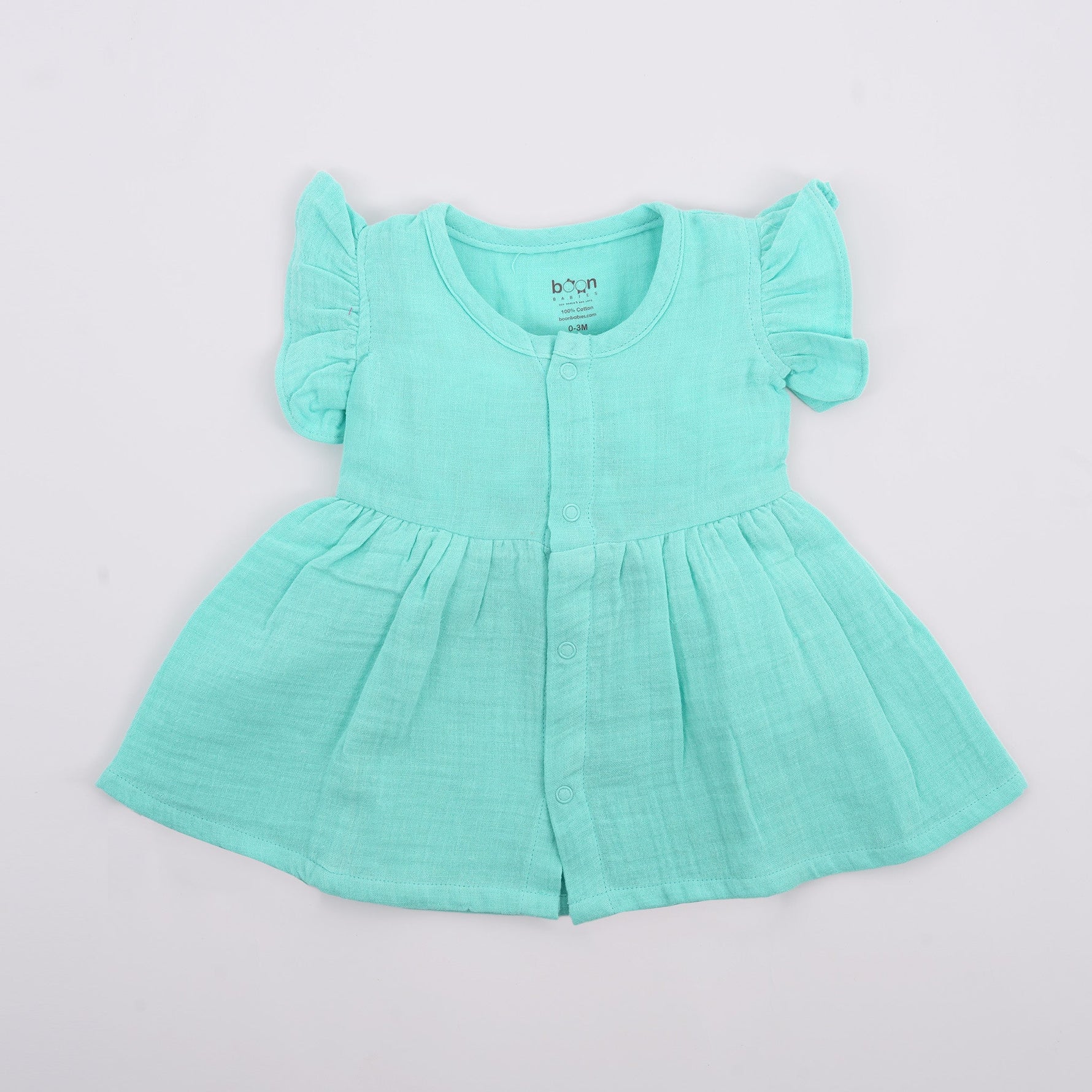 Mint green crinkled muslin frill frock for baby girls by Boon Babies, featuring soft fabric and delicate ruffle details.