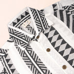 Black and white printed boys' cotton casual shirt with straight collar, half sleeves, by Boonbabies.