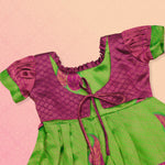 Elegant green and pink tissue silk Pattu Pavadai for girls, ethnic frock by Boon Babies featuring intricate design and vibrant colors.