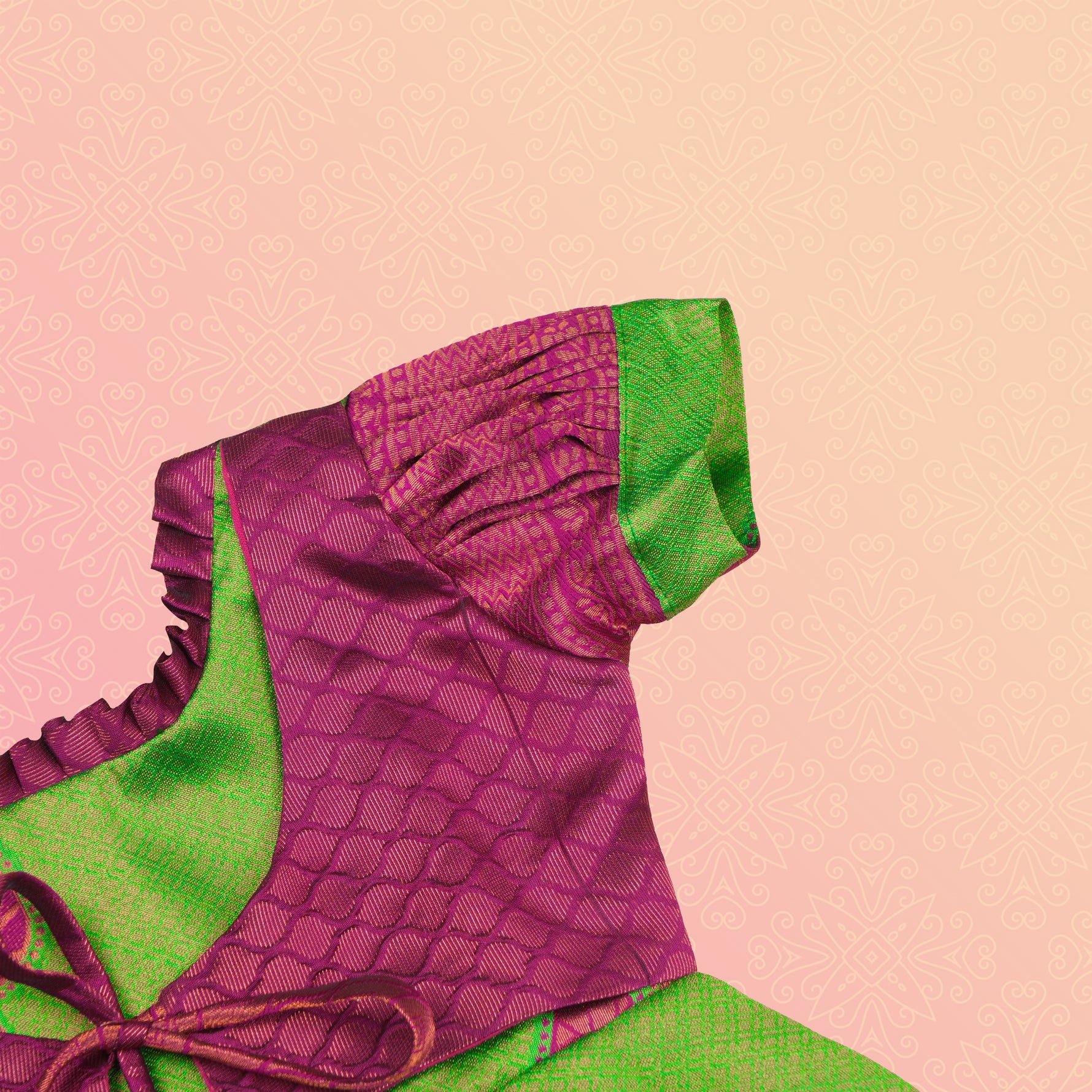 Elegant green and pink tissue silk Pattu Pavadai for girls, ethnic frock by Boon Babies, featuring intricate traditional design.