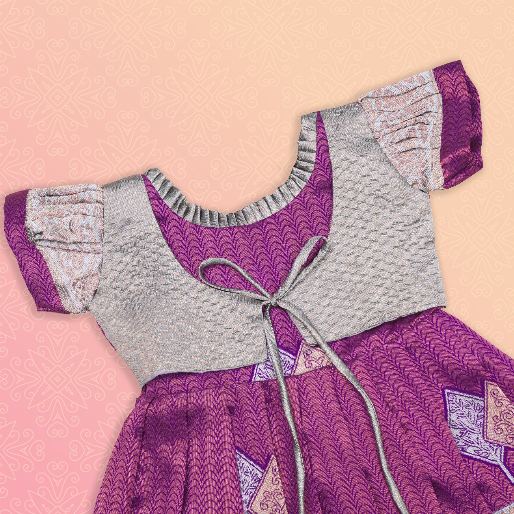 Elegant purple and silver ethnic Pattu frock for girls by Boon Babies, featuring intricate detailing and traditional style.