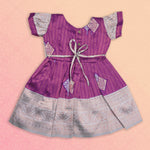 Purple and silver ethnic frock for girls by Boon Babies, featuring intricate design and traditional pattu fabric.