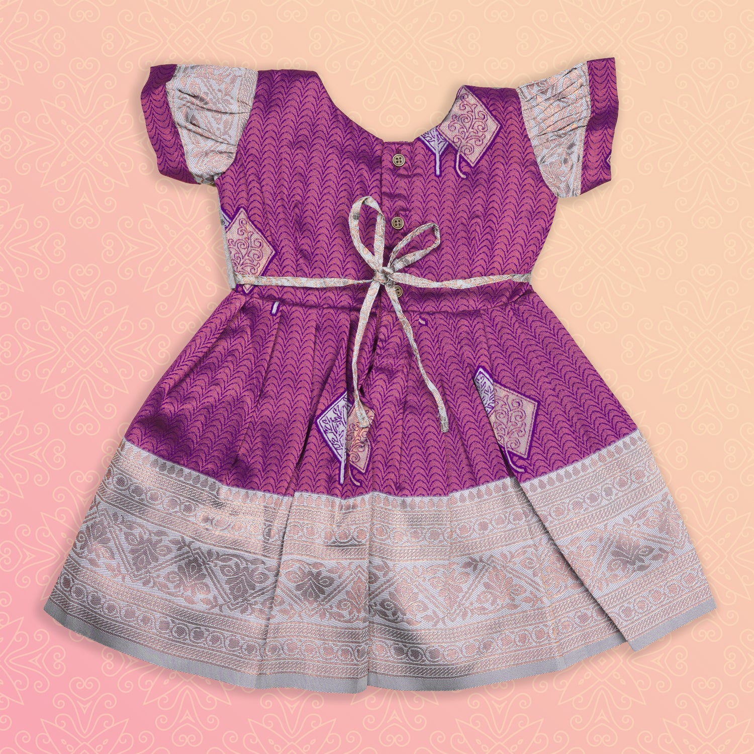 Purple and silver ethnic frock for girls by Boon Babies, featuring intricate design and traditional pattu fabric.