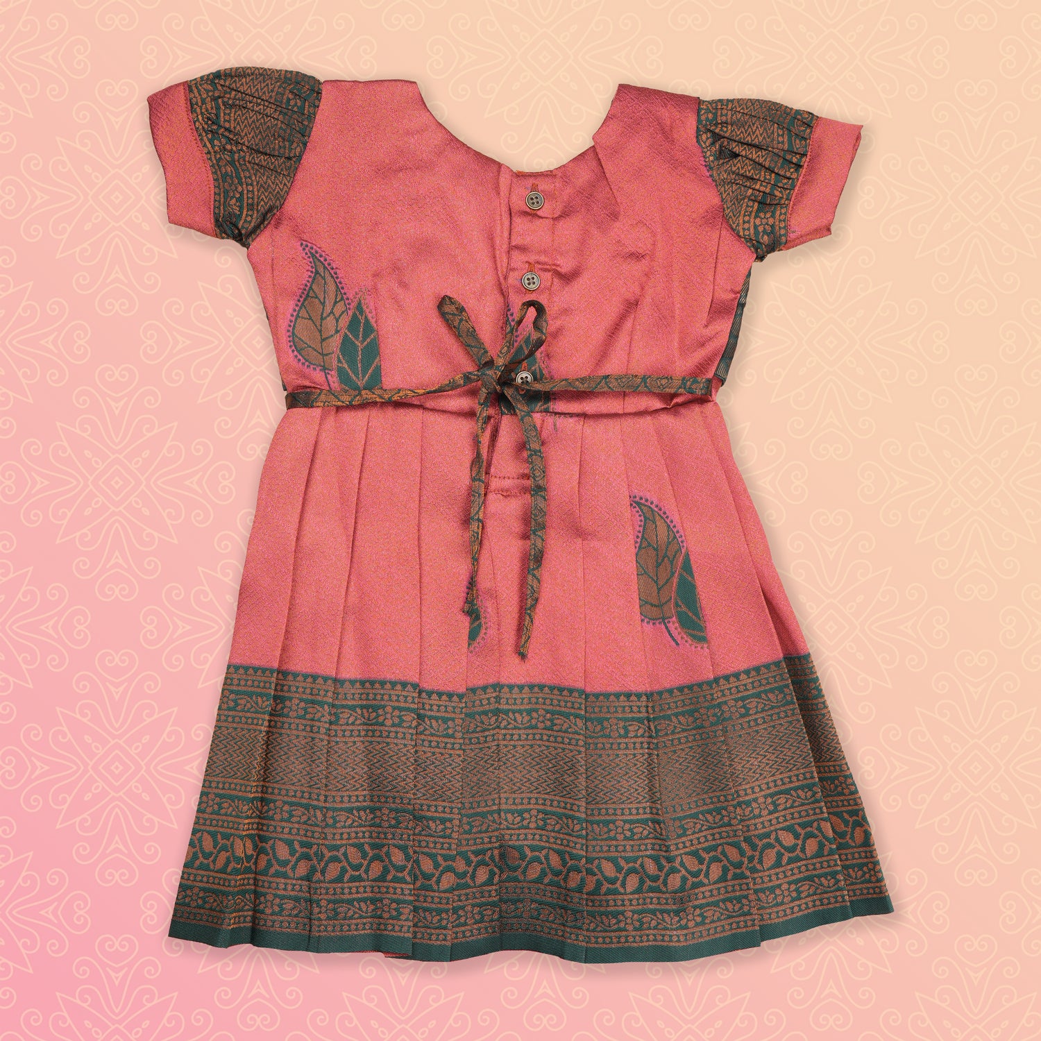 Elegant peach and green tissue silk Pattu Pavadai for girls, ethnic frock by Boon Babies with intricate traditional design.